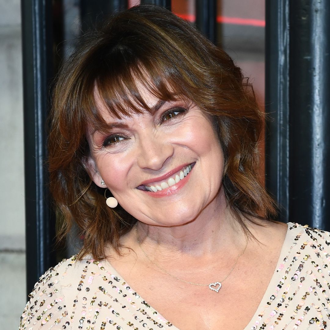 Beaming Lorraine Kelly rocks black bob and cascading veil in rare wedding photo with lookalike father