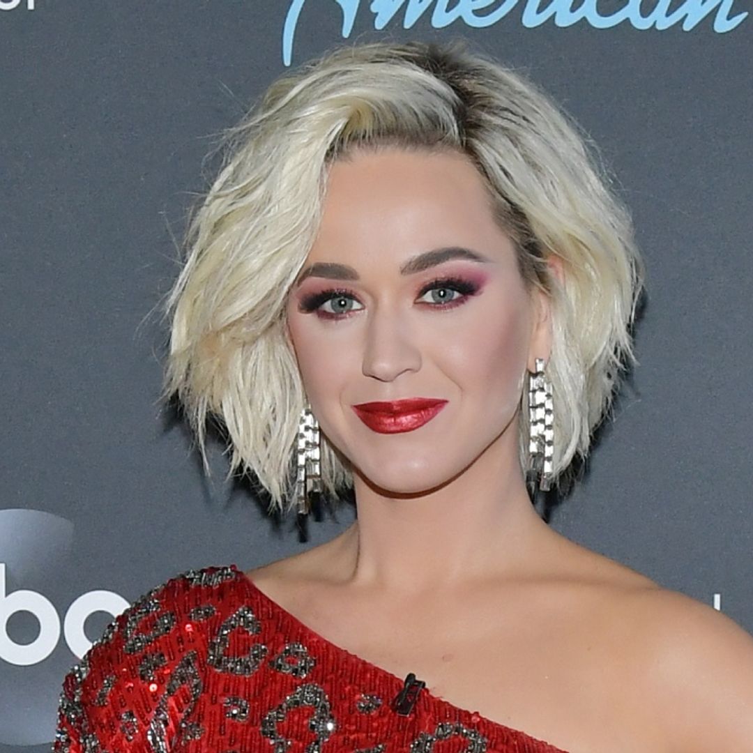 Katy Perry shines in the most dazzling holiday-themed catsuit to announce big news