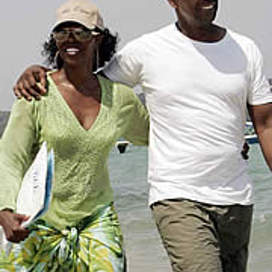 Denzel and Andrea enjoy beachside romance