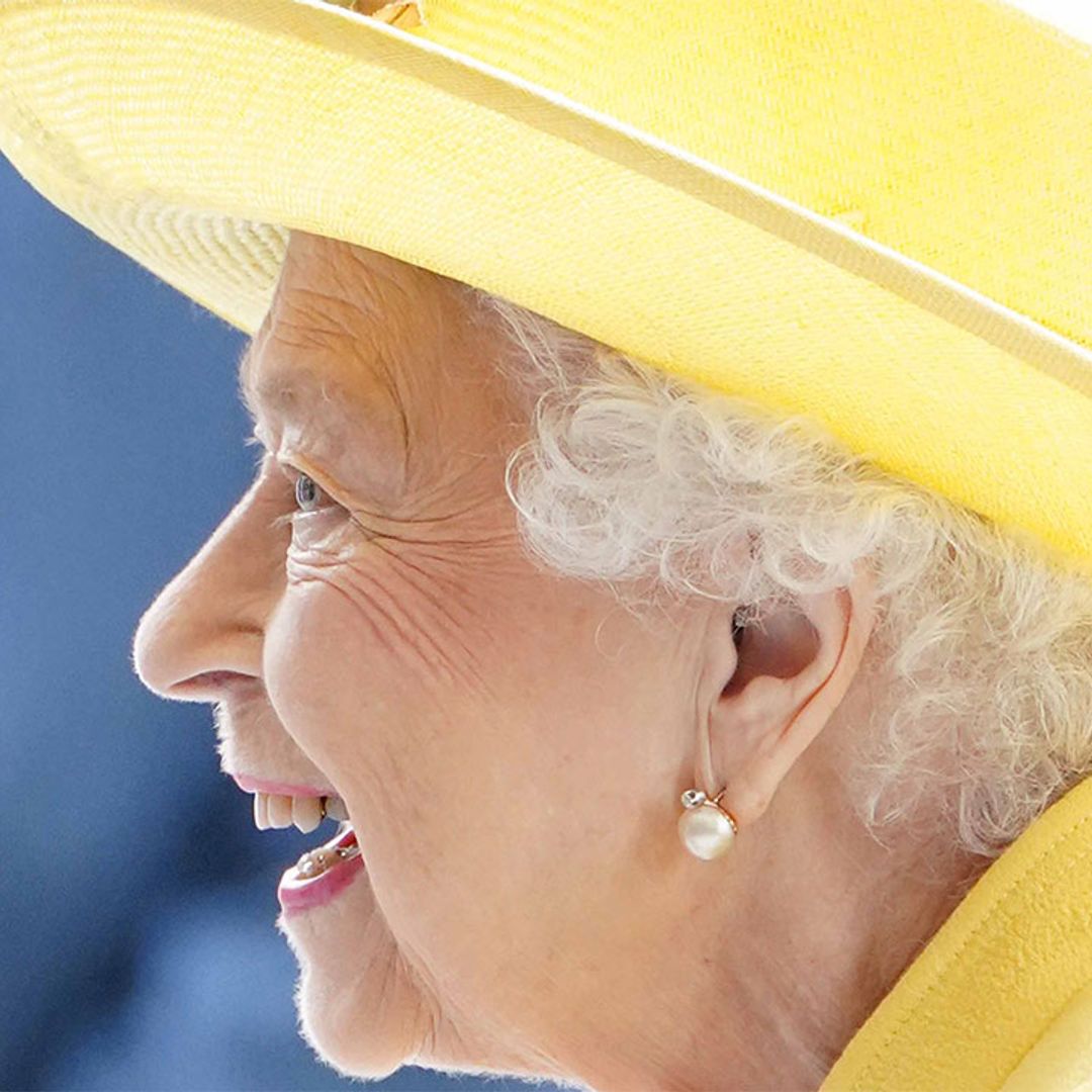 The Queen opens the Elizabeth line in the most vibrant outfit she's ever worn