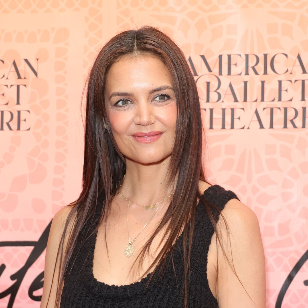 Katie Holmes showcases her incredible physique in tight black dress after revealing diet secrets