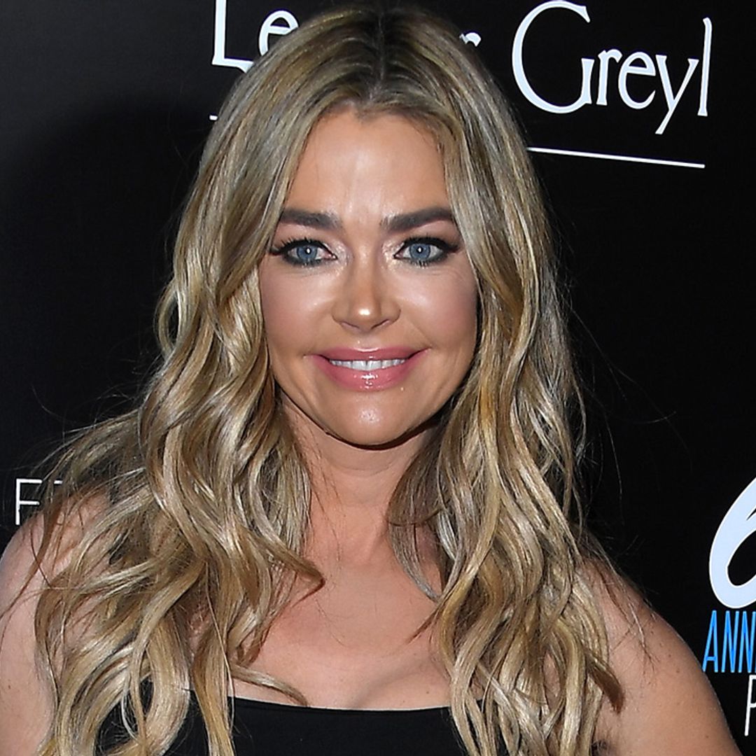 Denise Richards looks unbelievable as she poses in lace underwear and stiletto heels