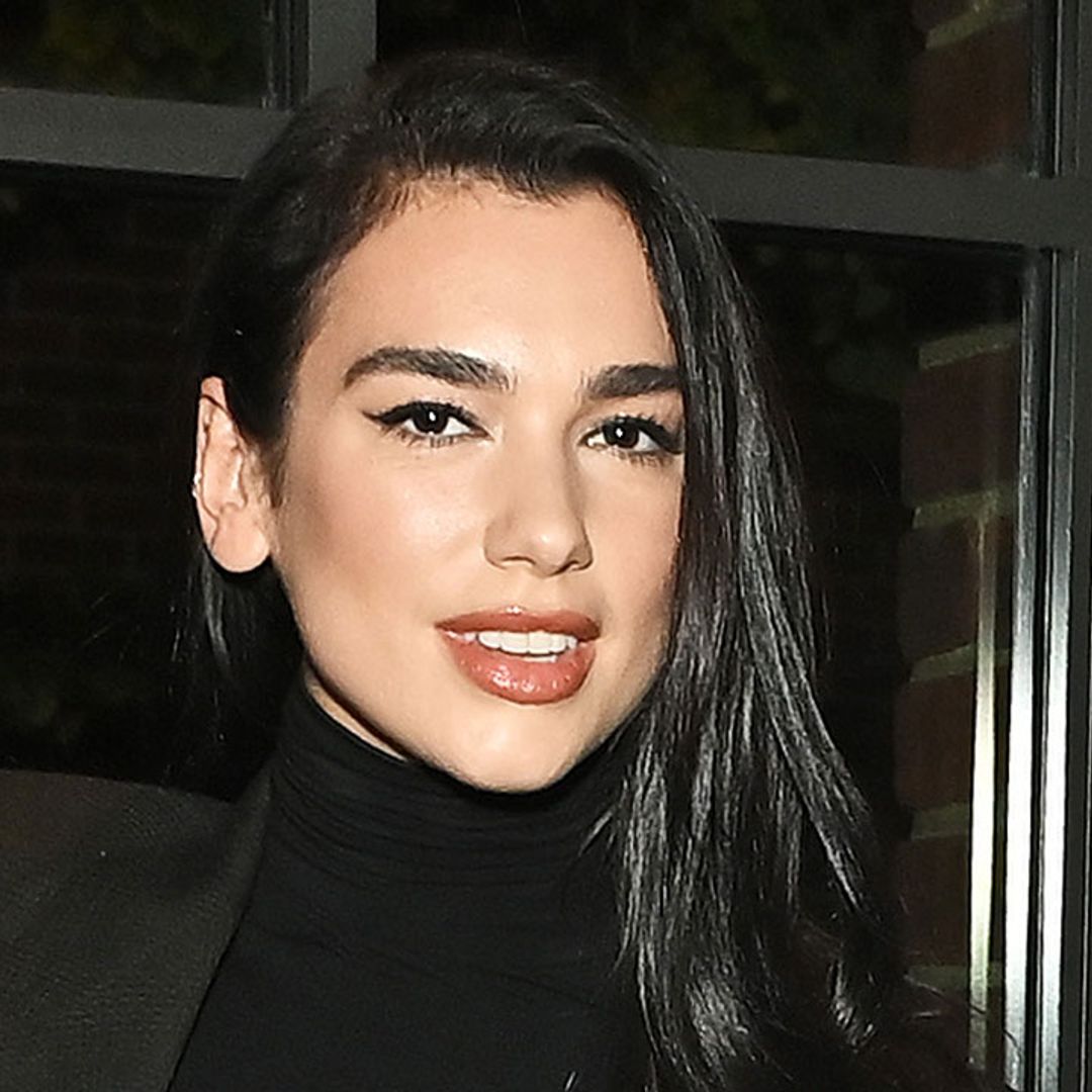 Dua Lipa looks chic in androgynous monochrome - and fans are obsessed