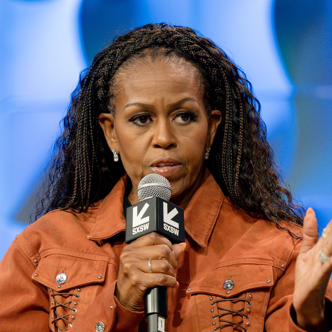 Michelle Obama challenges daughter Malia's decision to drop family name as she and sister Sasha 'push away'