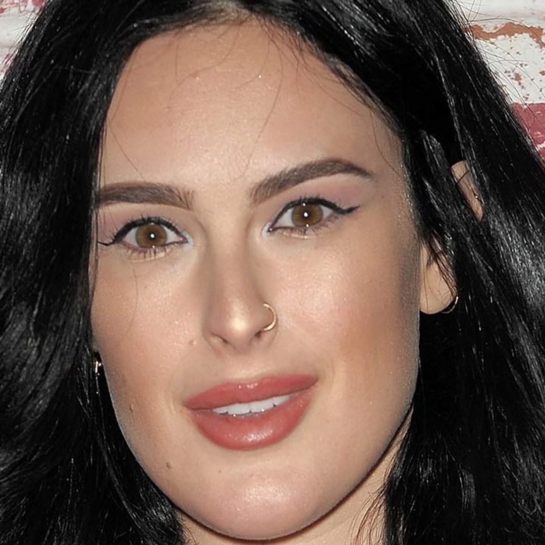 Rumer Willis teases fans with baby bump snap – 'Coming 2022'
