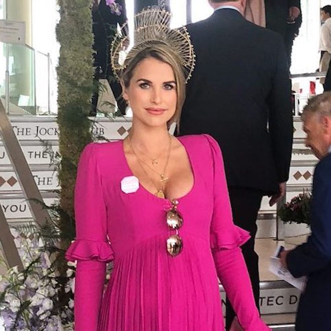 Vogue Williams steps out in bold pink maxi dress and a VERY statement head piece for Epsom Ladies Day