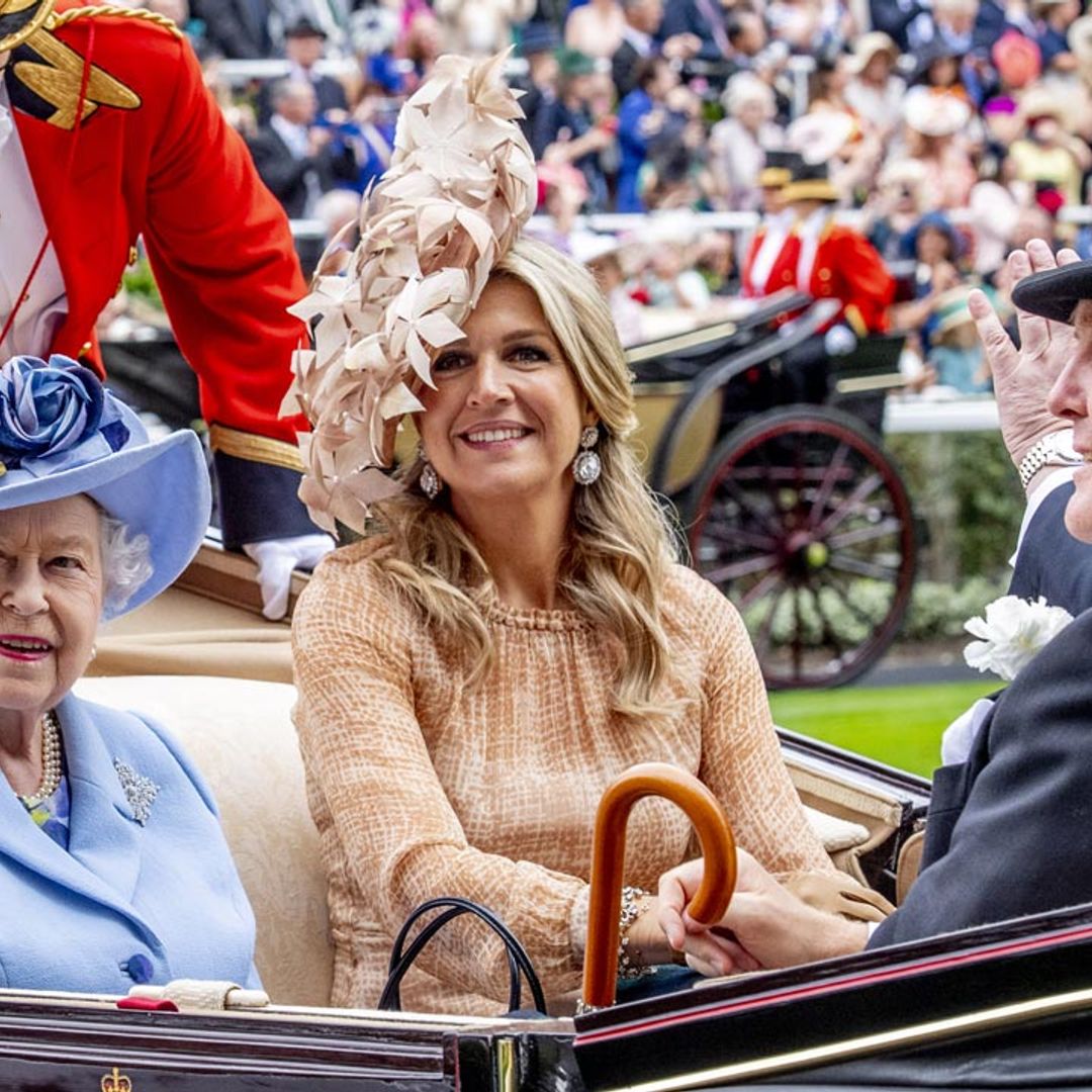 Did you notice the Queen's touching gesture to Queen Maxima at Royal Ascot? See photo