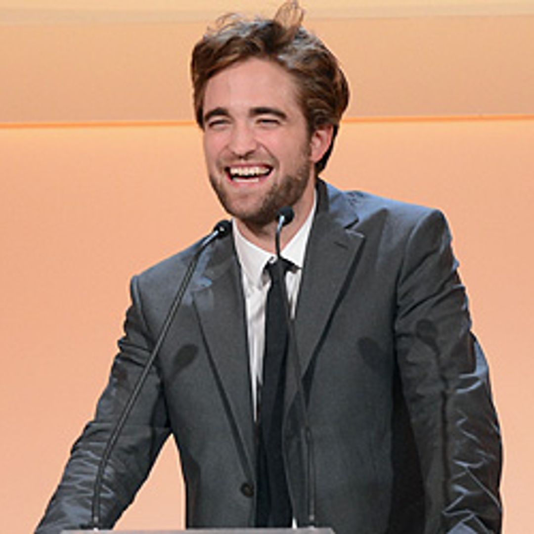 Robert Pattinson could be off the market as he is pictured getting close with his co-star