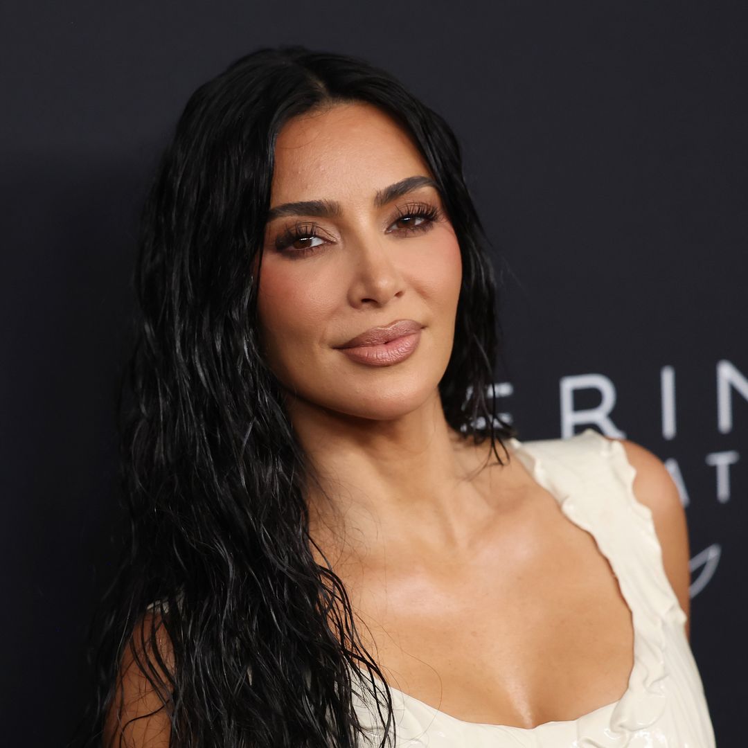 Kim Kardashian takes the 'naked dress' trend to the extreme in see-through lace look