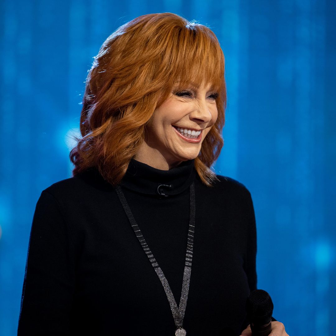 Reba McEntire's grown up son is her twin as they pose for rare family photo on special day