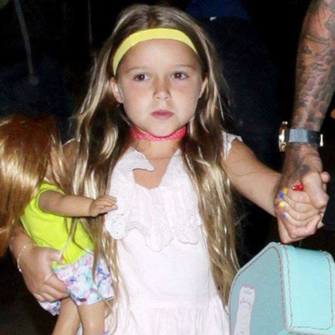 Harper Beckham causes mum Victoria to laugh during story time
