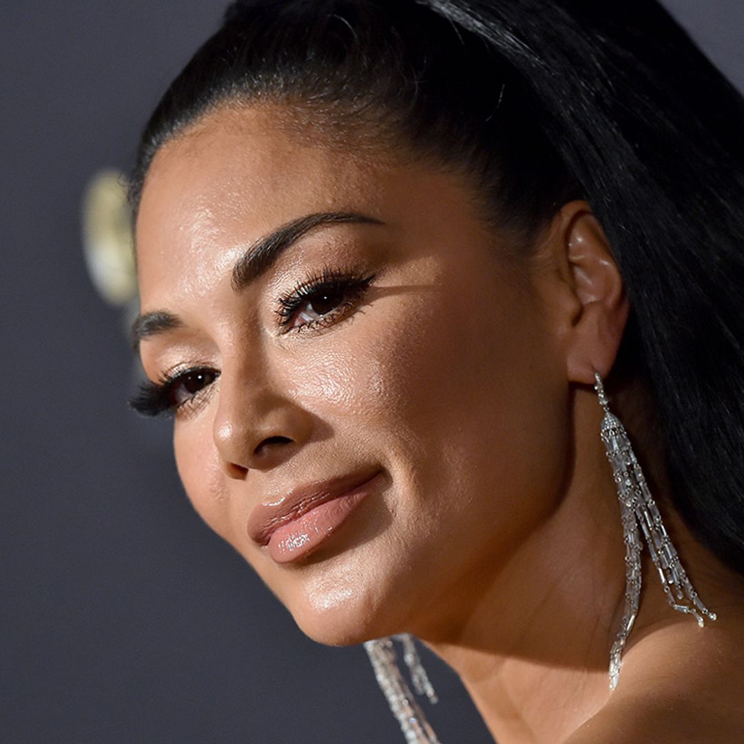 Nicole Scherzinger completely steals the show in flowing white gown