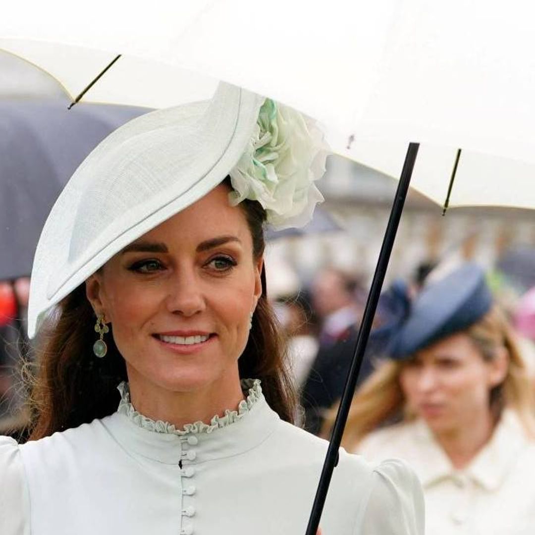 Kate Middleton and Prince William brave the rain to attend Buckingham Palace garden party – best photos