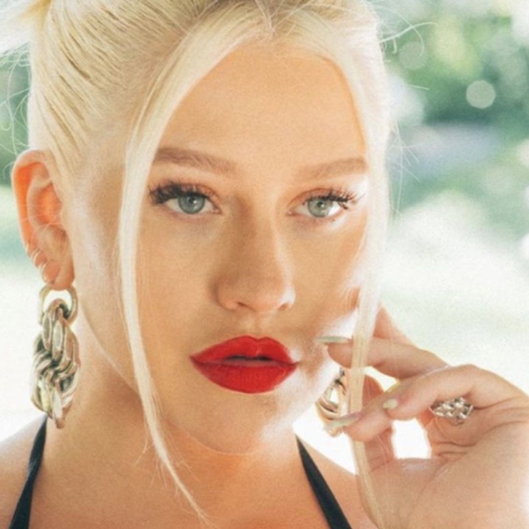 Christina Aguilera wows with stunning swimsuit photos