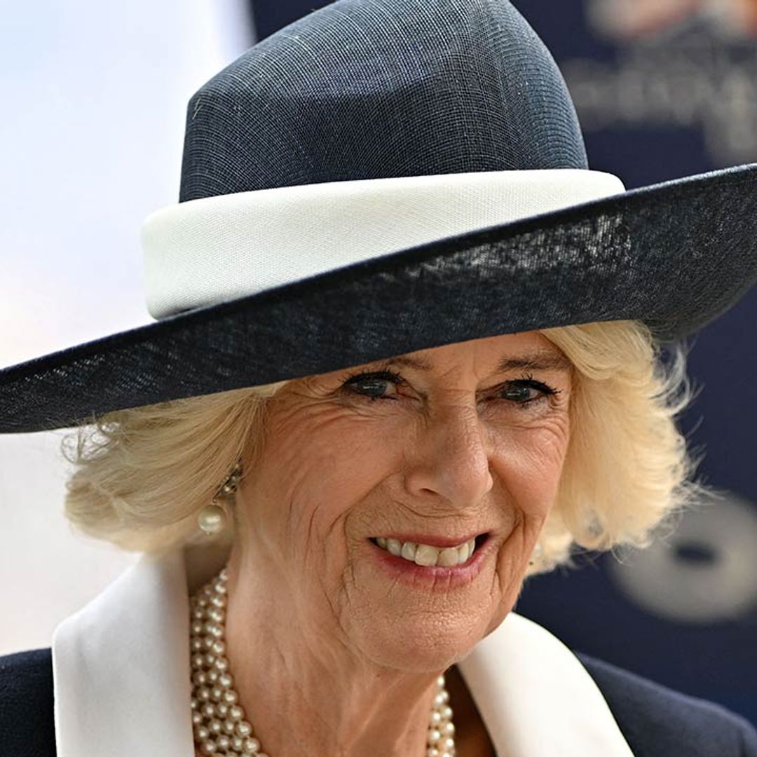 Queen Consort Camilla is the epitome of elegance in navy co-ord