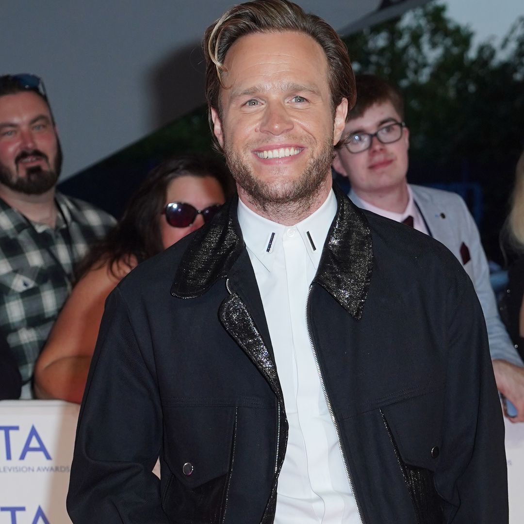 Olly Murs poses with baby daughter Madison after 'extra special' night