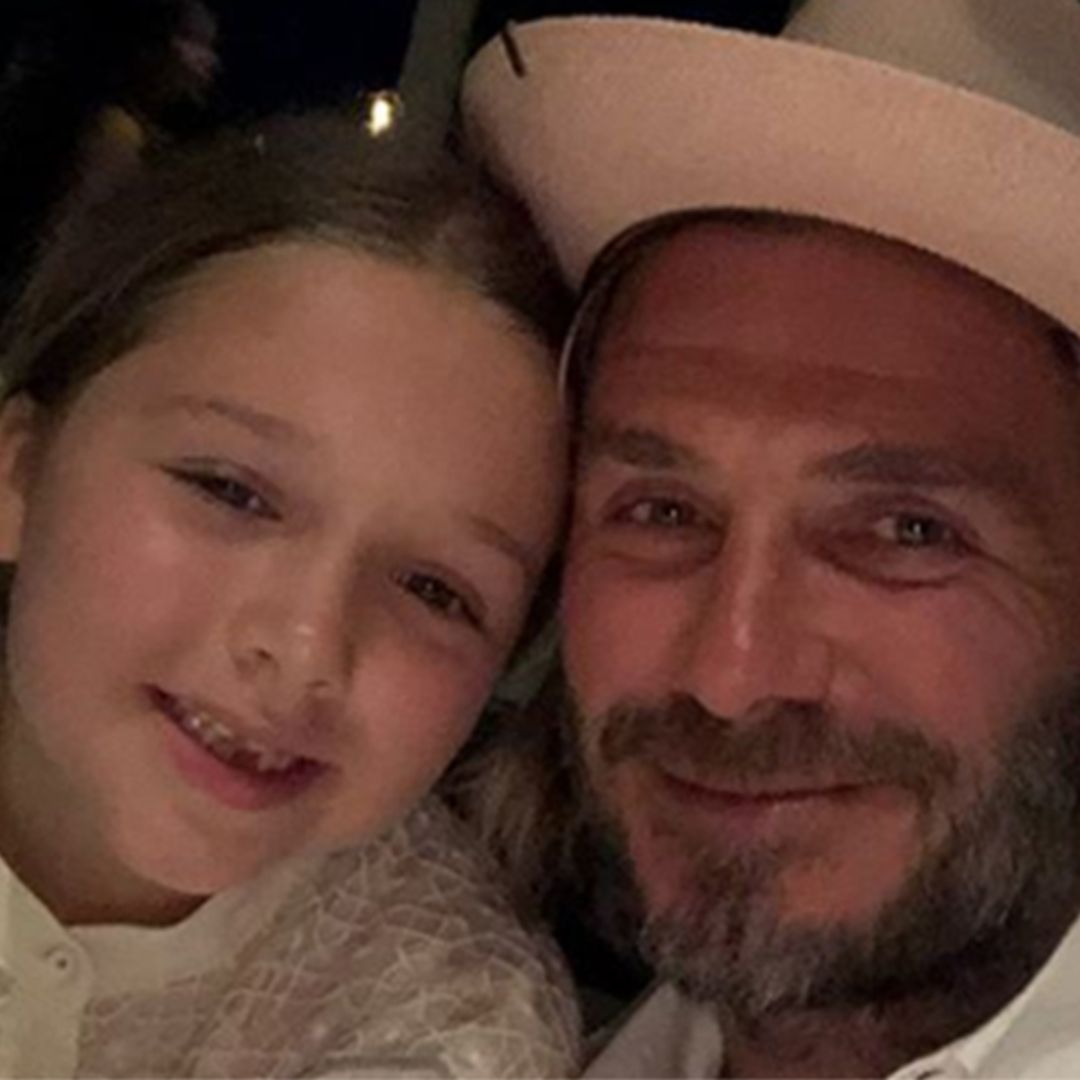 Seeing double! Harper Beckham wears mask of dad David's face in hilarious photo