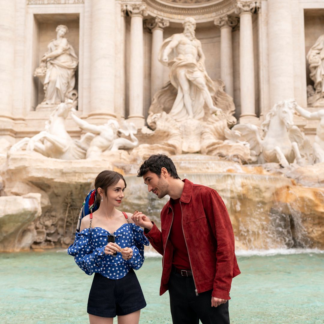 Lily Collins as Emily and Eugenio Franceschini as Marcello in in series 4 of the hit show