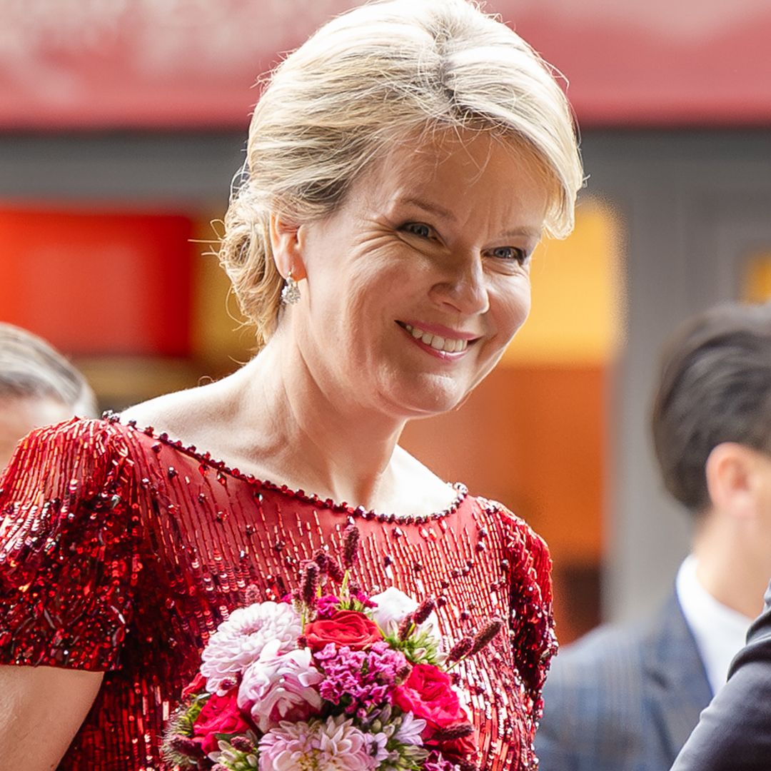 Queen Mathilde channels Princess Kate in red bodycon sparkles