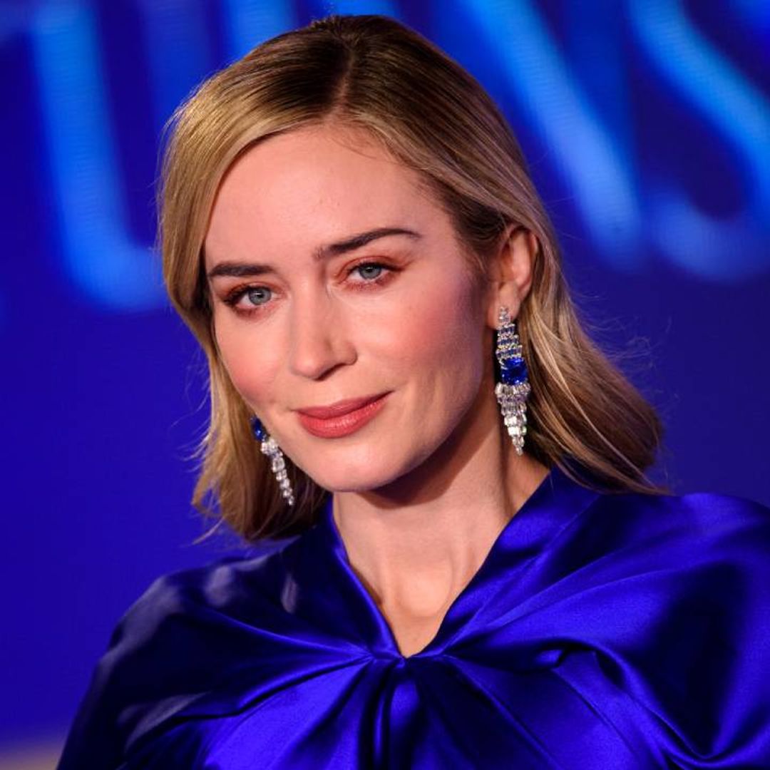 Emily Blunt stuns in a hot pink Gucci blouse we want in our closets right now