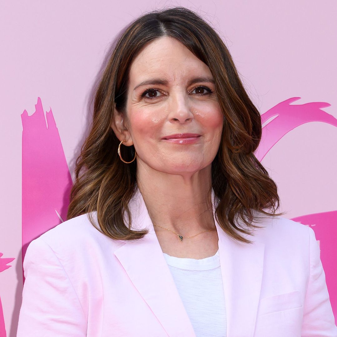 Tina Fey towers over husband on glamorous date night 