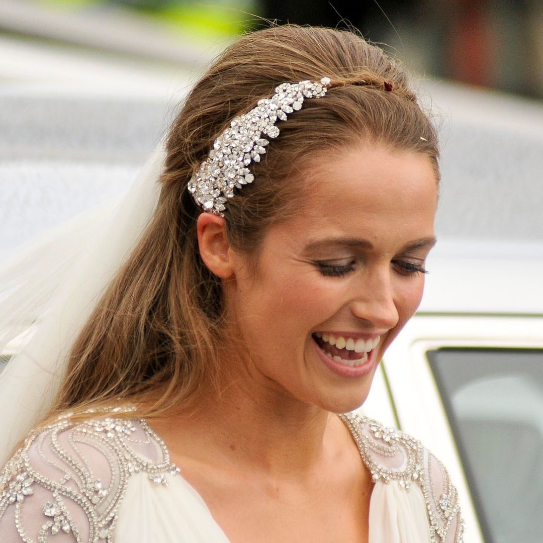 Andy Murray's wife Kim is a boho beauty in low-back bridal gown in unseen wedding photo