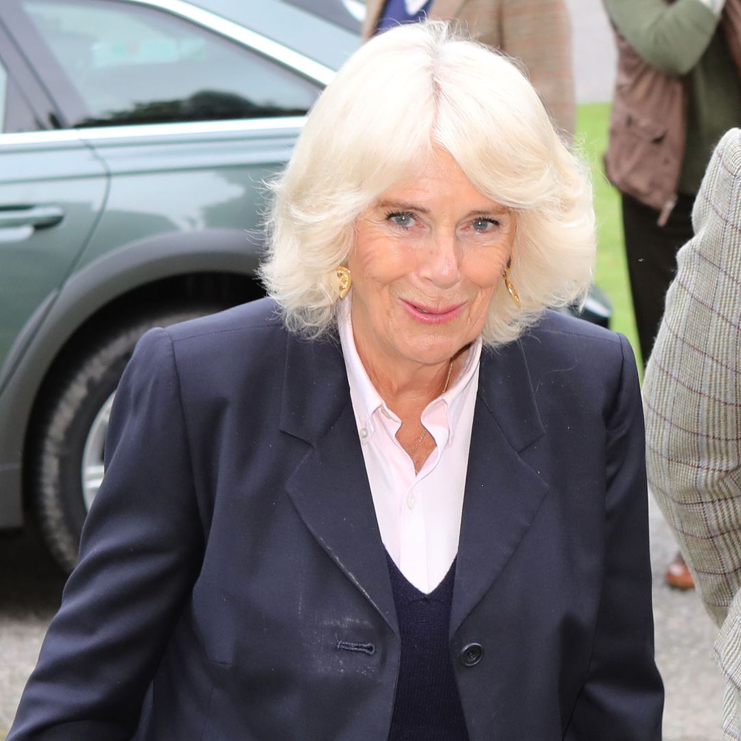 Queen Camilla goes barefoot in chic airport outfit to jet set with King Charles