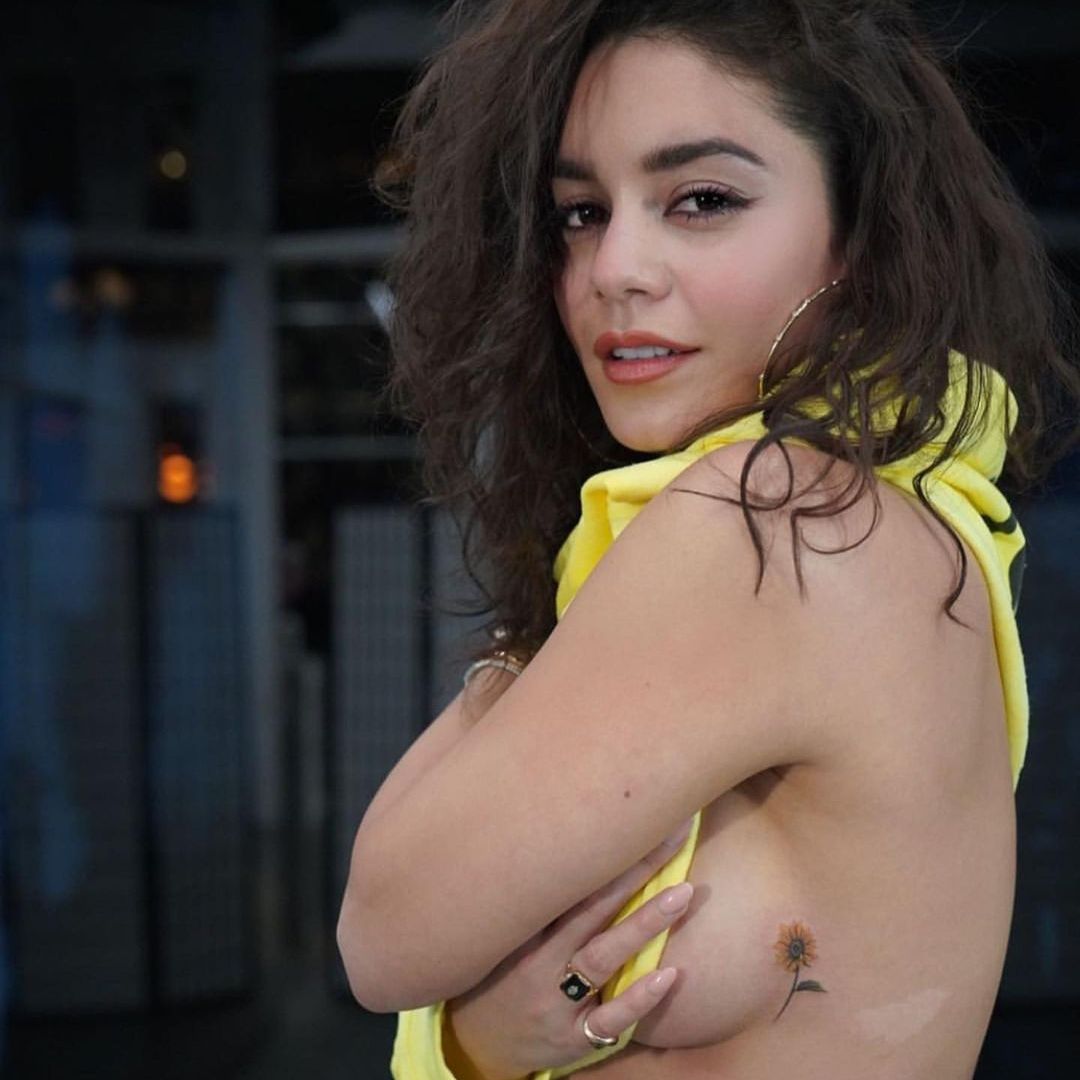 Vanessa Hudgens showing off her sunflower tattoo on her ribcage 