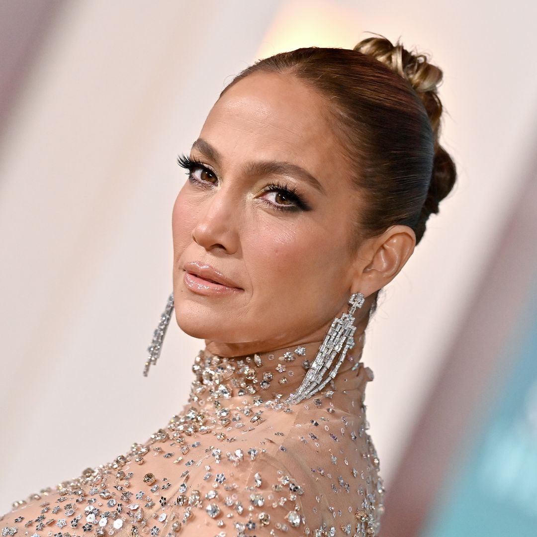 Jennifer Lopez, 54, looks incredible as she showcases bare chest and abs in plunging dress