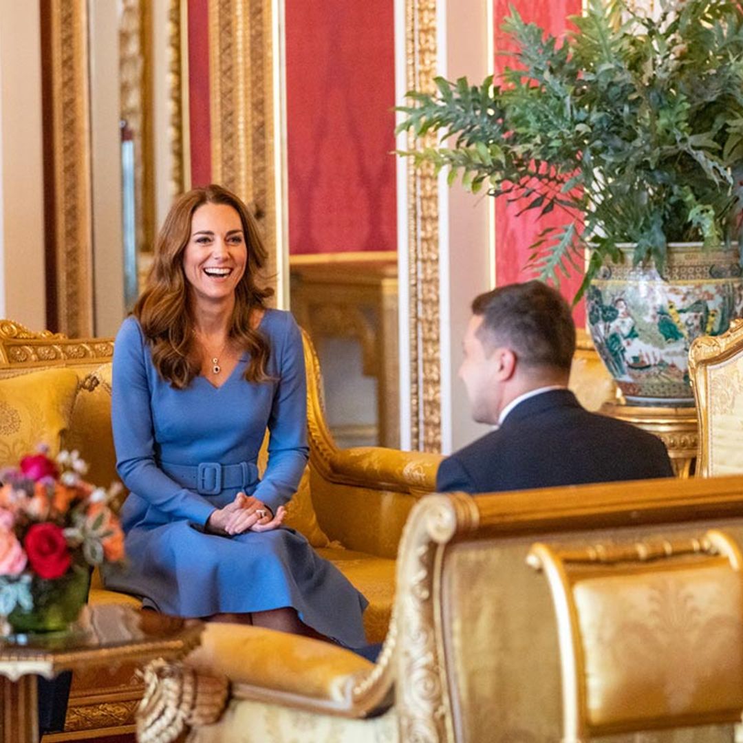 Kate Middleton and Prince William beam with happiness as they welcome guests back to Buckingham Palace