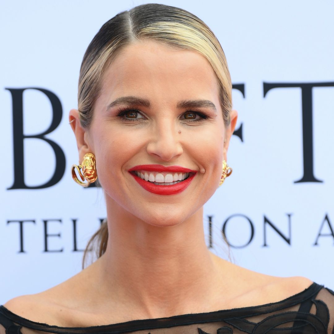 Vogue Williams shows off incredible abs in black bikini during freezing family holiday