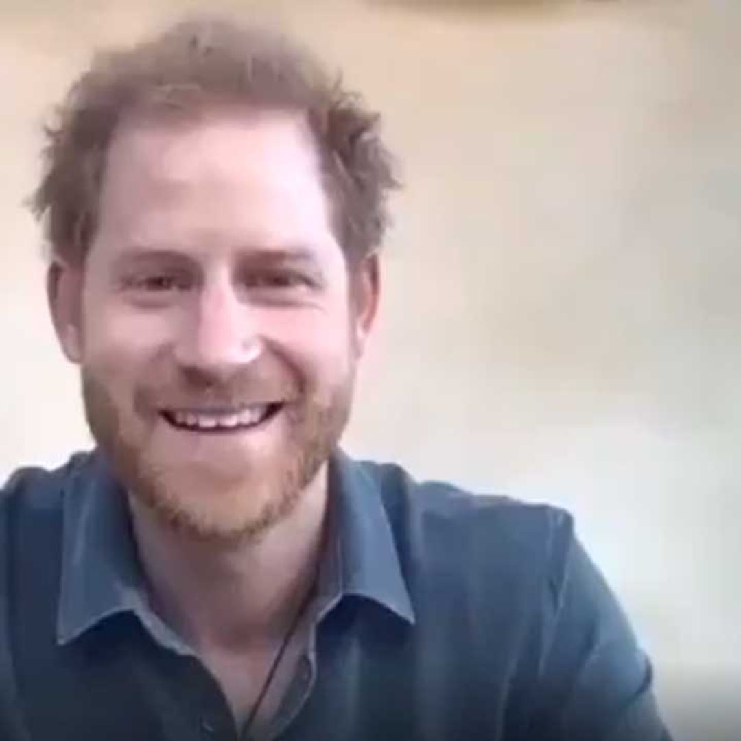 Prince Harry speaks to young volunteers from garden of his LA home - watch video