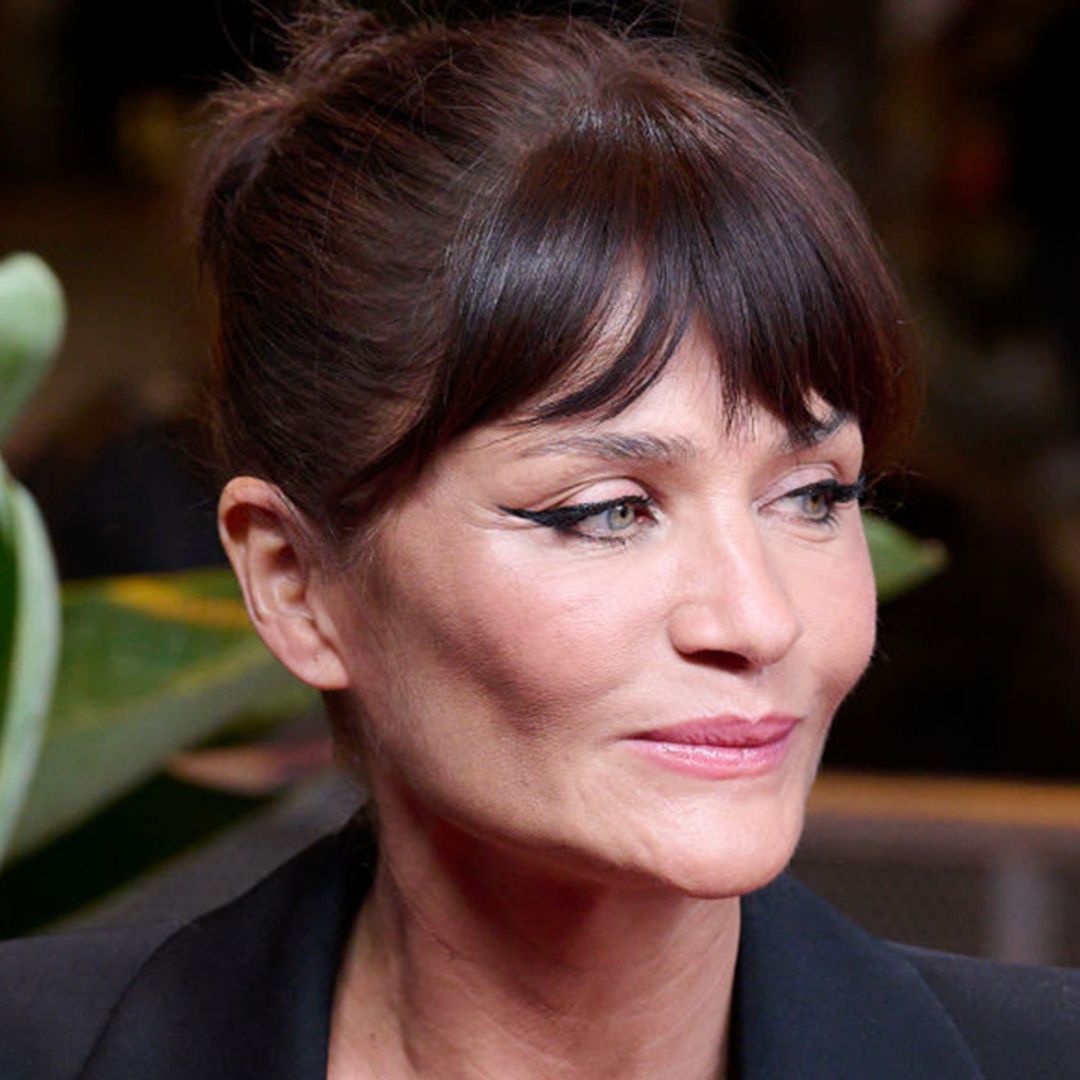 Helena Christensen turns up the heat in sheer lace lingerie