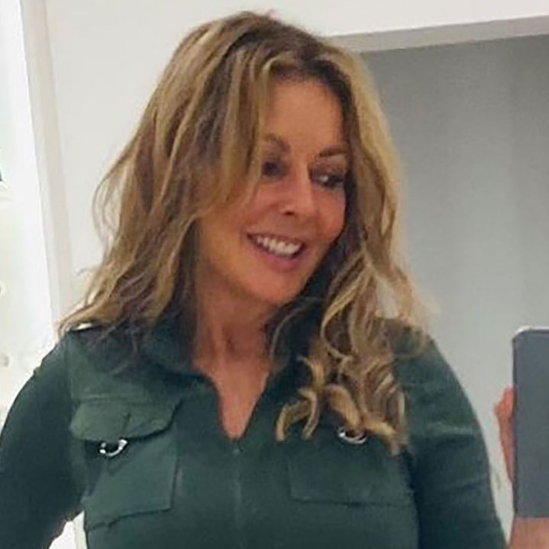 Carol Vorderman is Lara Croft's double in figure-hugging outfit and leather boots