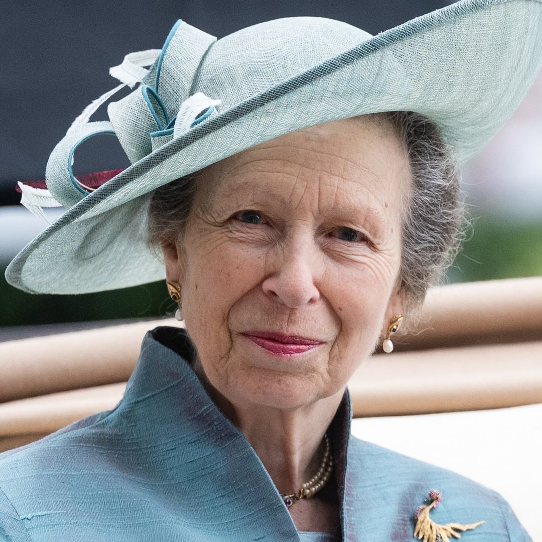 Princess Anne looks elegant in flippy skirt and heeled boots