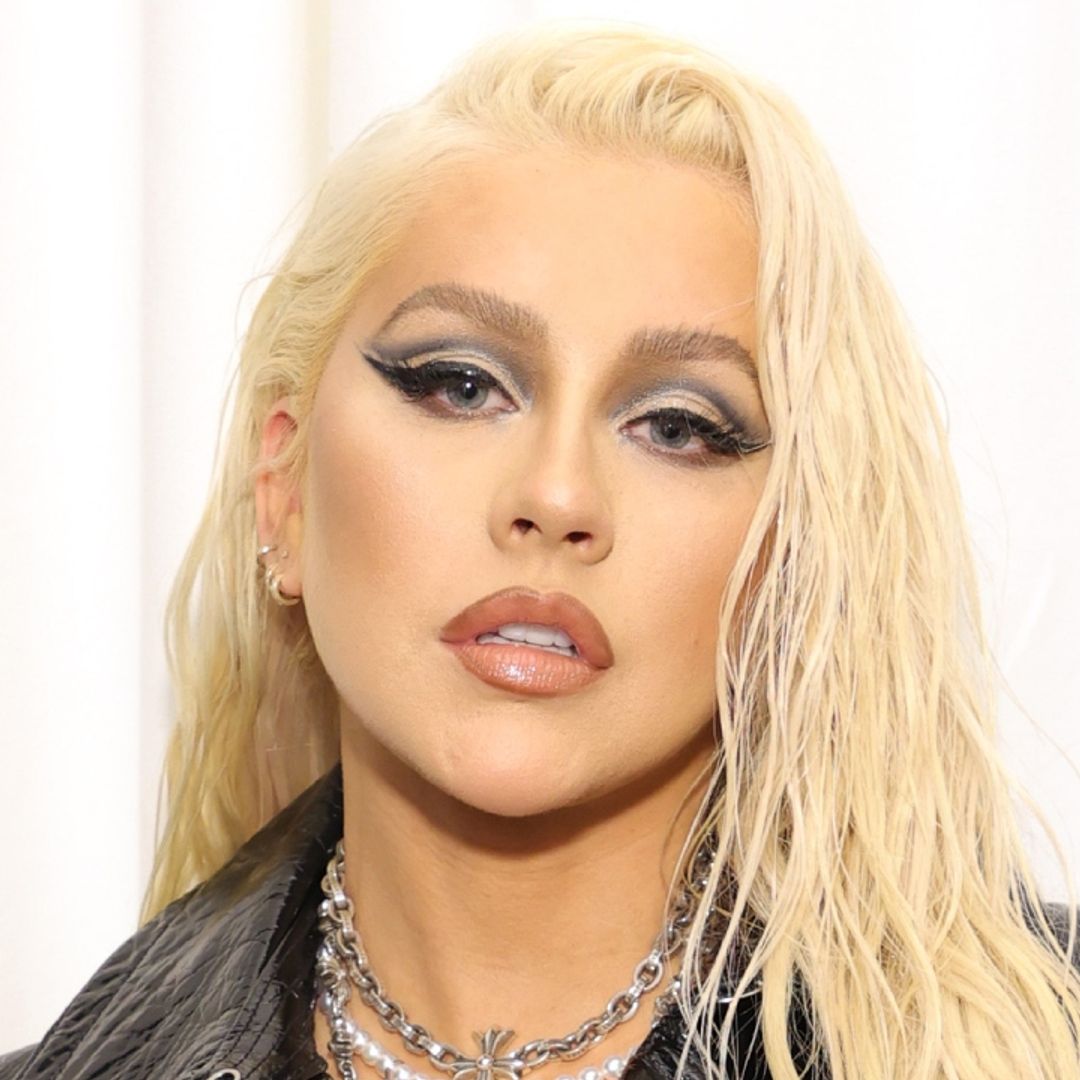 Christina Aguilera stuns in snakeskin bodysuit in photos you won't forget