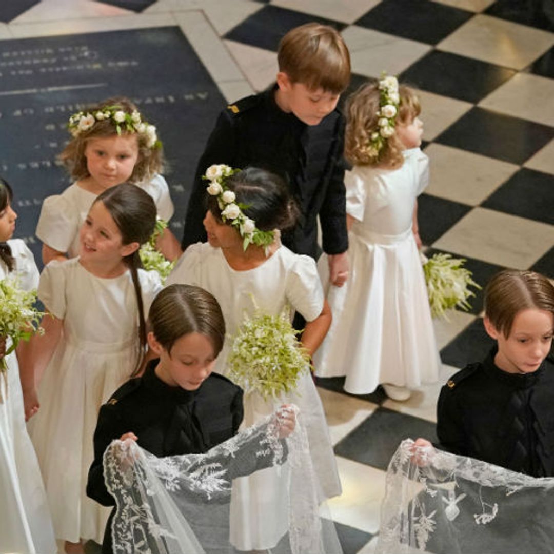 Revealed: why one little bridesmaid is missing a bouquet in official royal wedding pictures