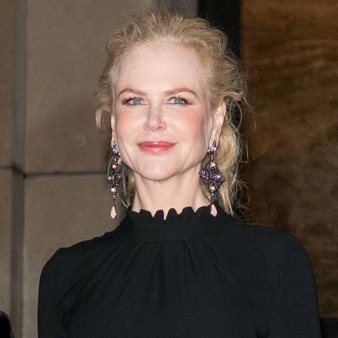 Nicole Kidman and daughters Sunday and Faith pose in the sea in never-before-seen photo