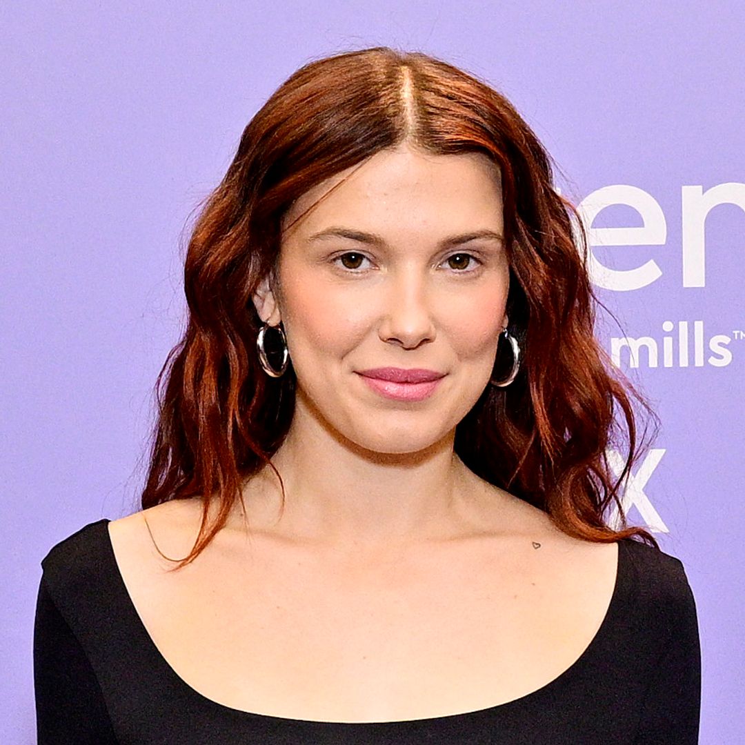 Millie Bobby Brown's scoop neck bodysuit and jeans combo is the epitome of laidback dressing