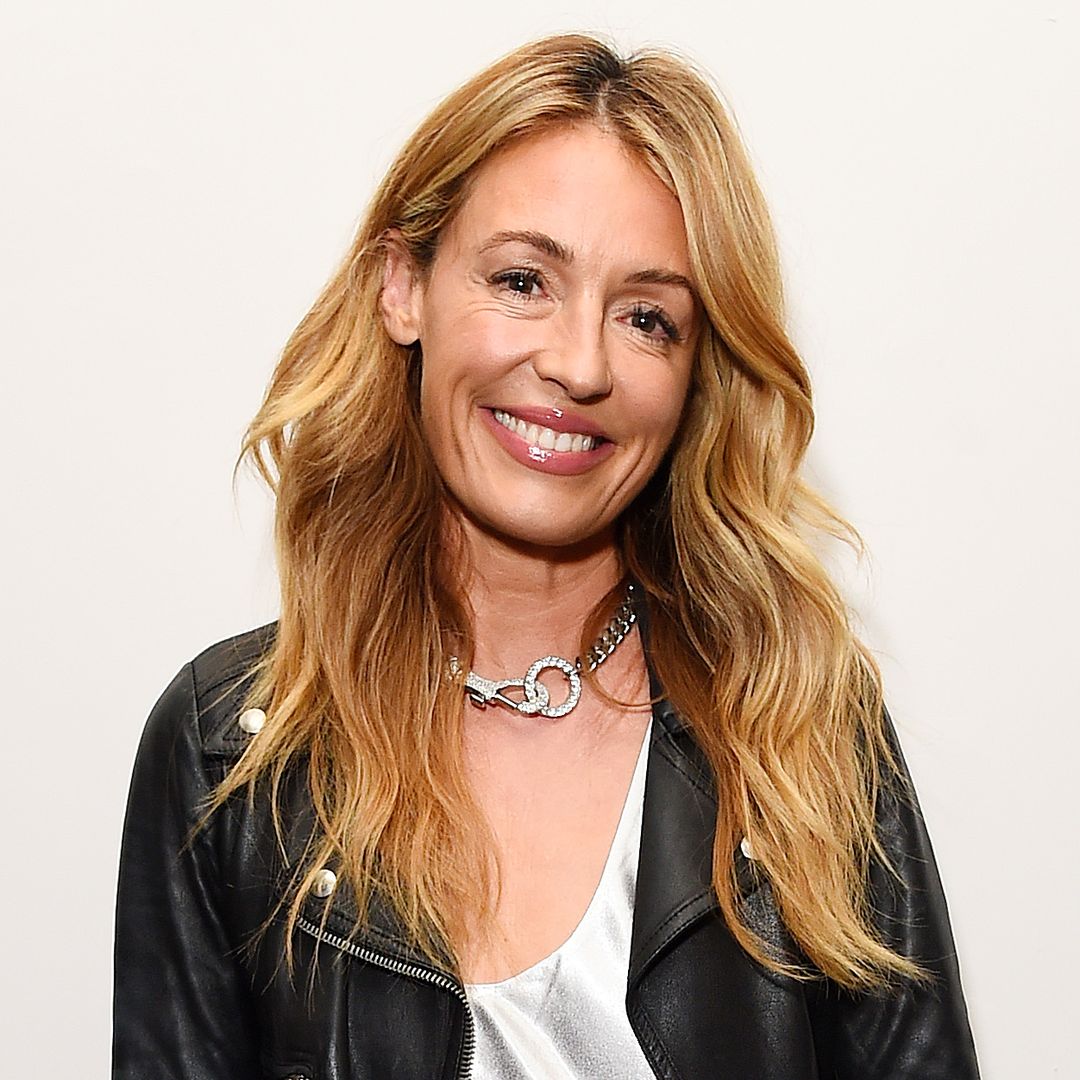 Cat Deeley makes glowing comeback in sheer blouse and fitted trousers