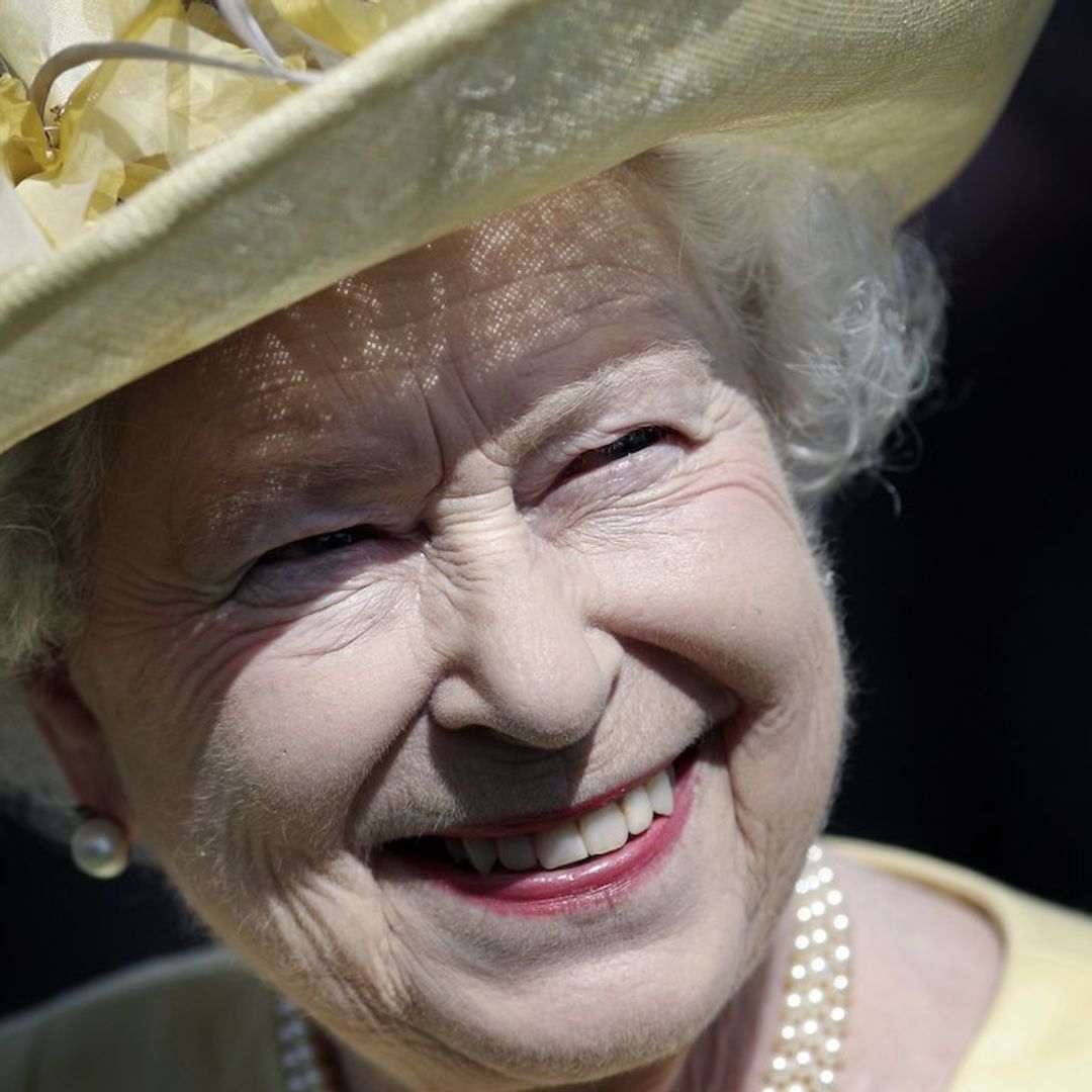 The Queen looks incredible in summer dress and wedges in candid new footage