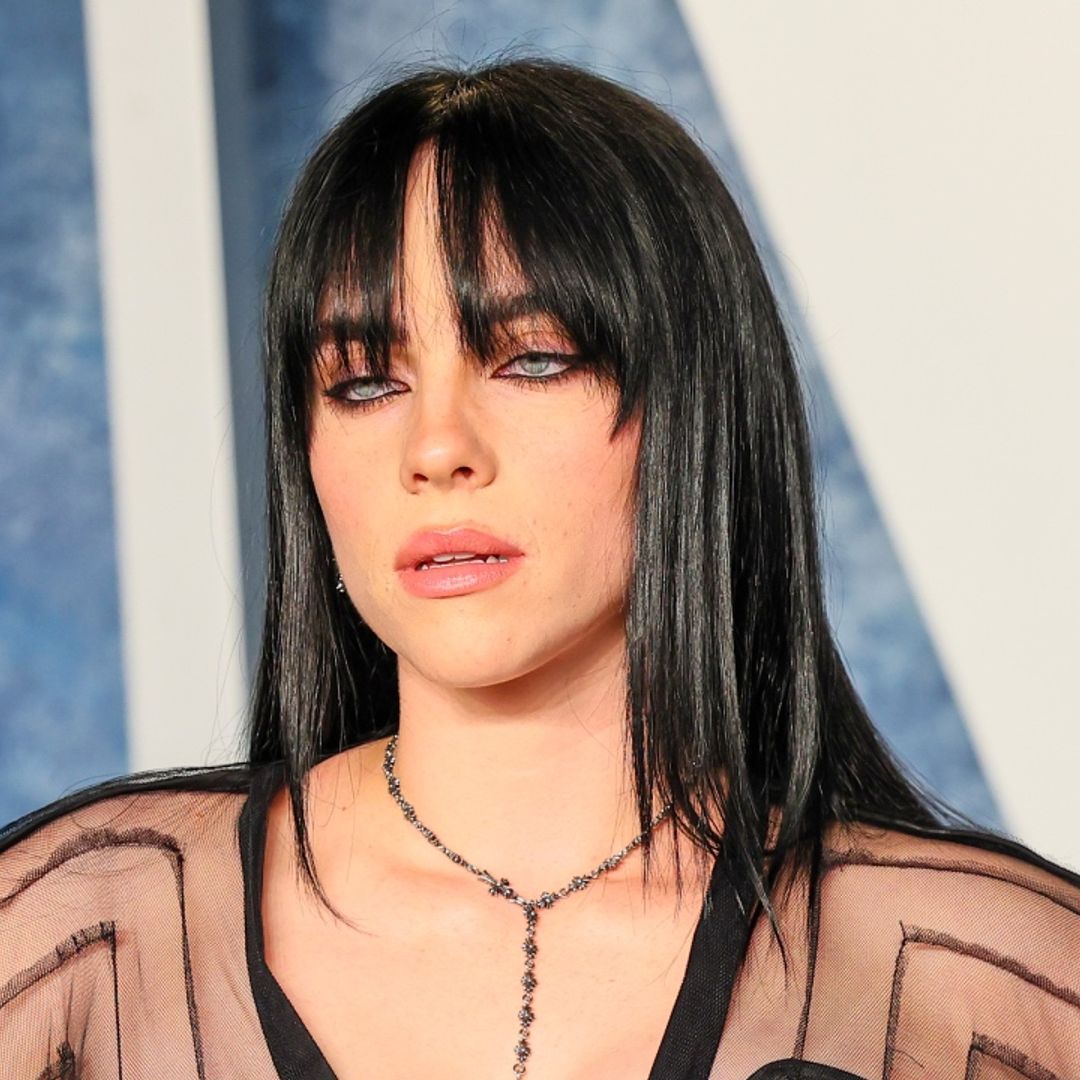 Billie Eilish dominates Oscars after-party with two dramatic sheer looks and rarely-seen boyfriend