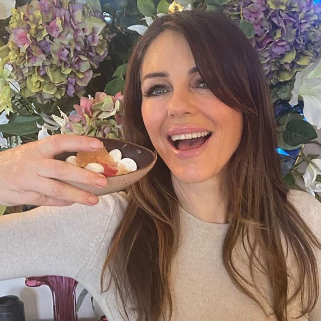 Elizabeth Hurley poses in skintight mini dress as she treats herself to an Easter feast
