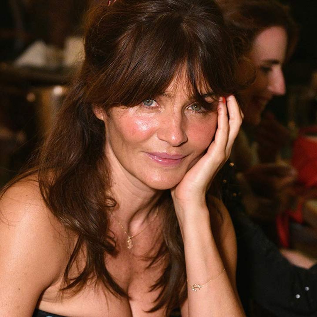 Helena Christensen looks phenomenal in plunging swimsuit for haunting photo