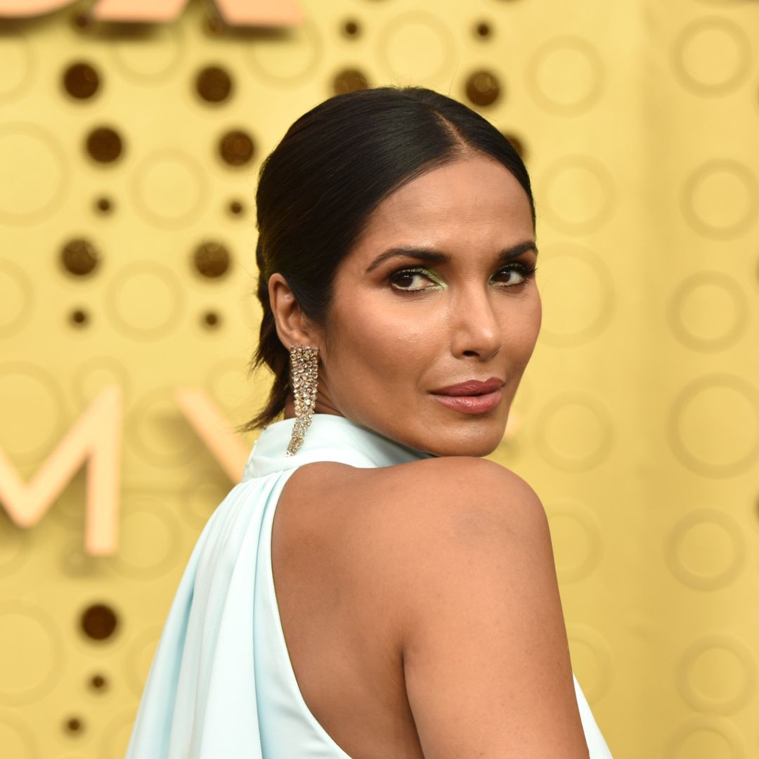 Padma Lakshmi looks drop-dead gorgeous posing in barely-there gold bikini for Swimsuit Issue
