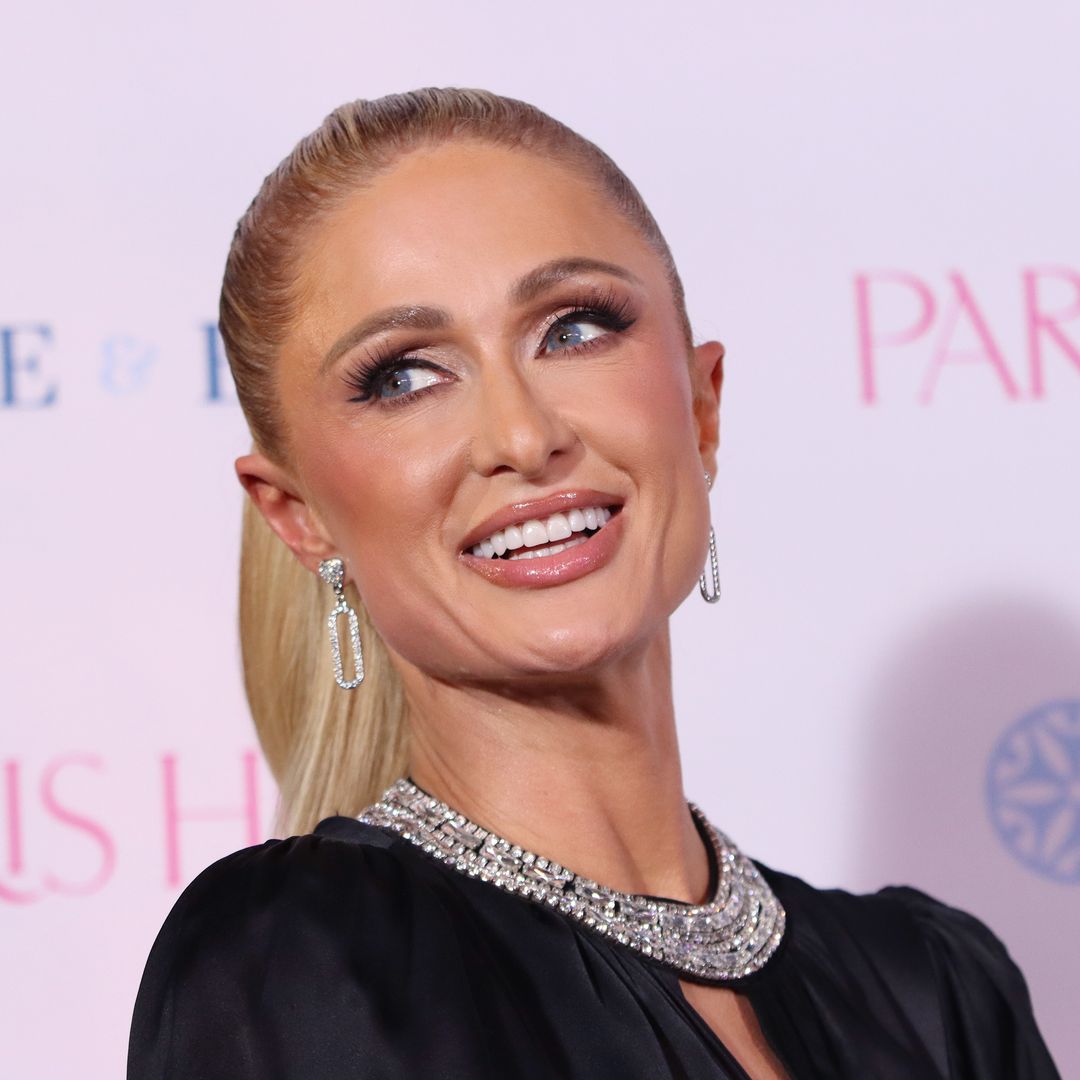 Paris Hilton dazzles in rhinestone plunging gown for glamorous baby-free reunion with Kim Kardashian