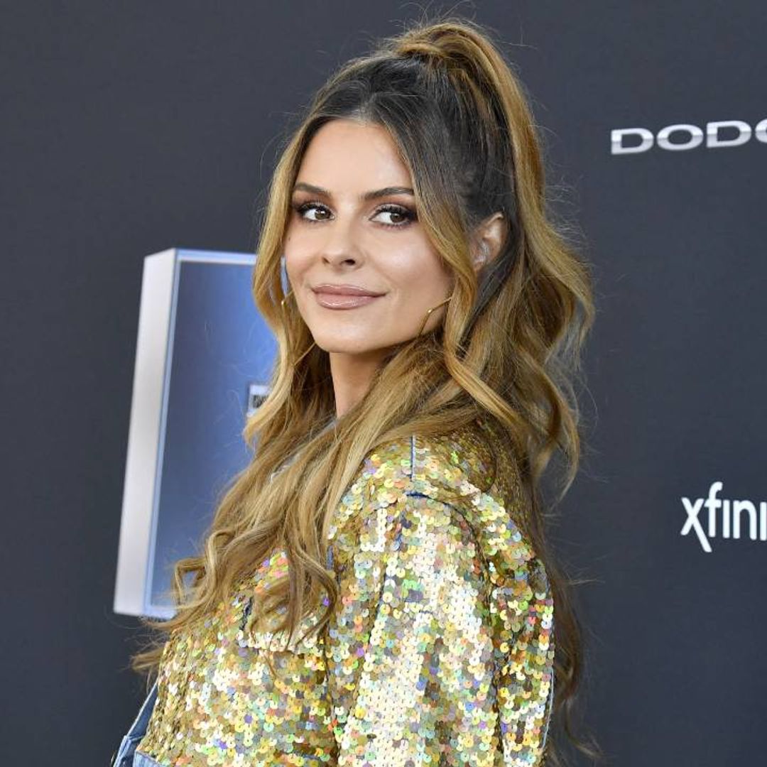 Maria Menounos dazzles in a dreamy floral dress in Kelly Ripa’s Live seat