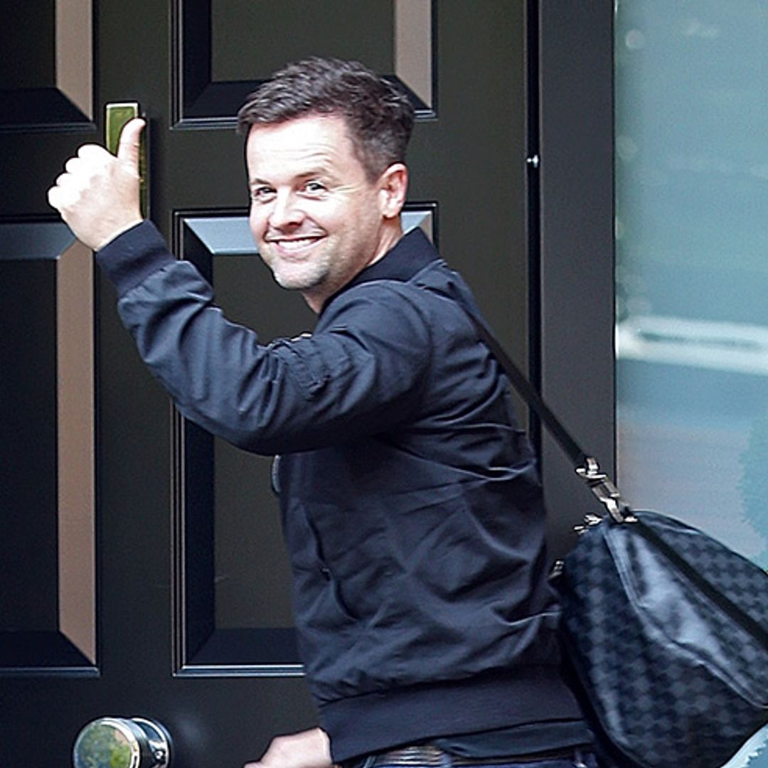 New dad Declan Donnelly is all smiles as he returns home after baby daughter's birth