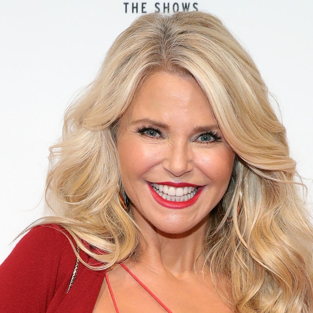 Christie Brinkley fights the heat in joyous photo in feathered mini dress