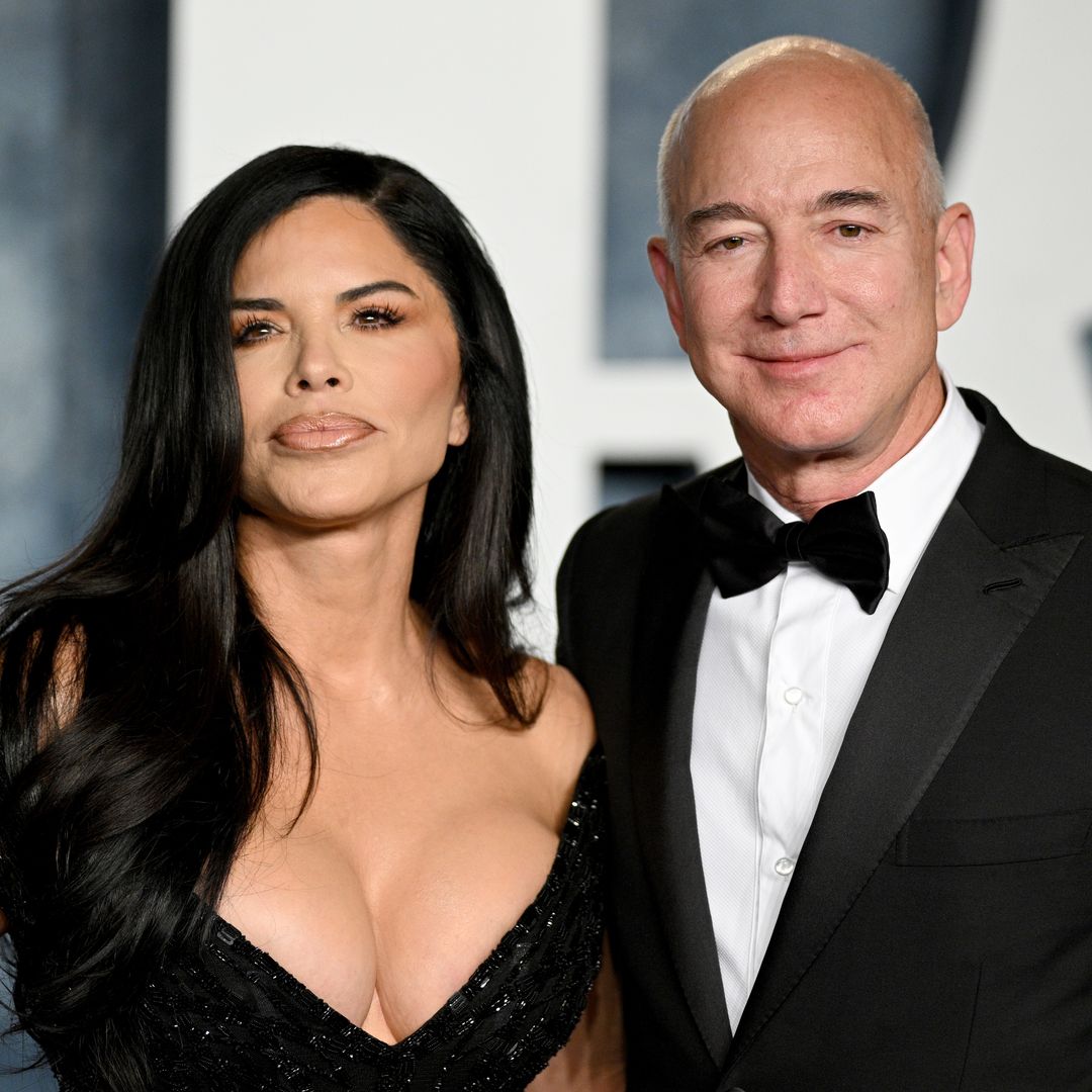 Lauren Sanchez's model son is almost as tall as famous 6ft 5 dad as they tower over Jeff Bezos in photo